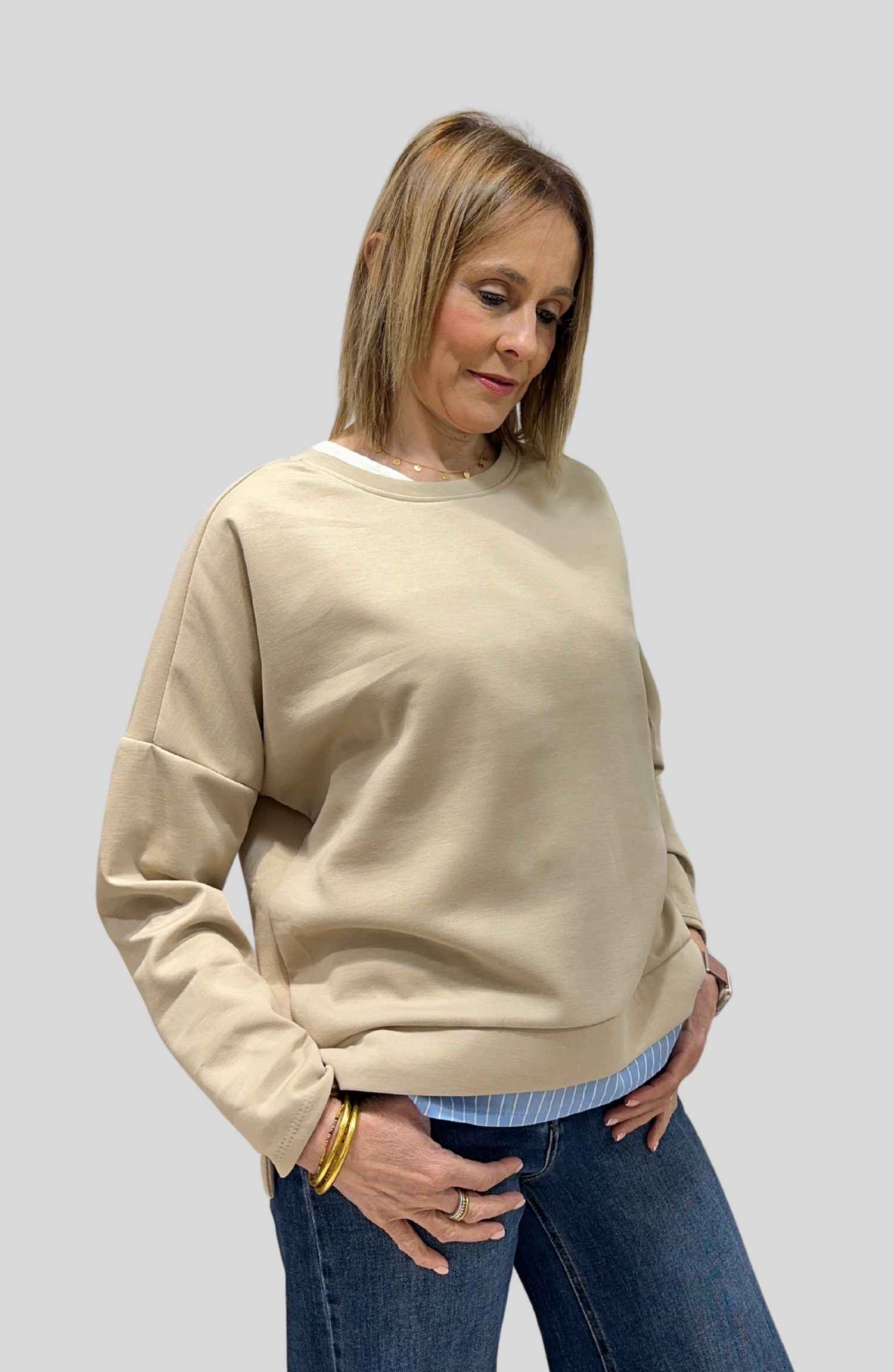 Articulo sudadera con bajo rayas beige en Ananda Boutique Granollers