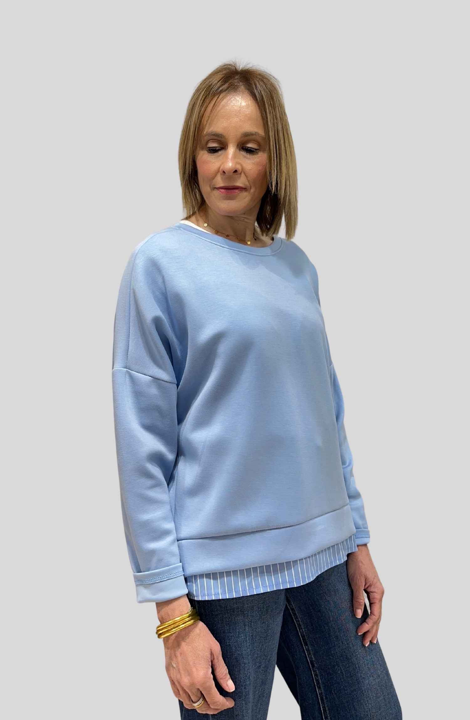 Articulo sudadera con bajo rayas celeste en Ananda Boutique Granollers